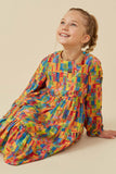 GY6493 Green Mix Girls Colorful Patch Print Long Sleeve Dress Pose