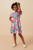 GY7933 Mint Girls Floral Print Smocked Waist Button Detail Dress Pose