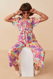 GY8032 Off White Girls Vivid Floral Self Belt Smocked Jumpsuit Front