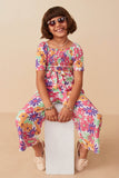 GY8032 Off White Girls Vivid Floral Self Belt Smocked Jumpsuit Full Body