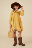 GY8746 MUSTARD Girls Gauze Textured Wavy Trimmed Madeline Dress Pose