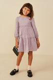 GY8900 Lavender Girls Floral Textured Button Back Ruffle Tiered Dress Pose